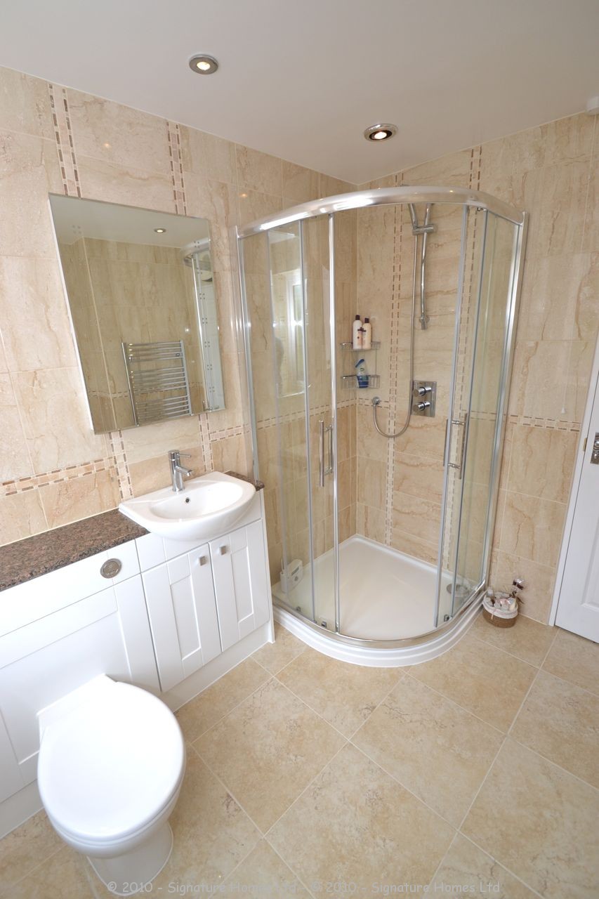 Fitted Bathroom with knock through in Banstead by our bathroom fitters